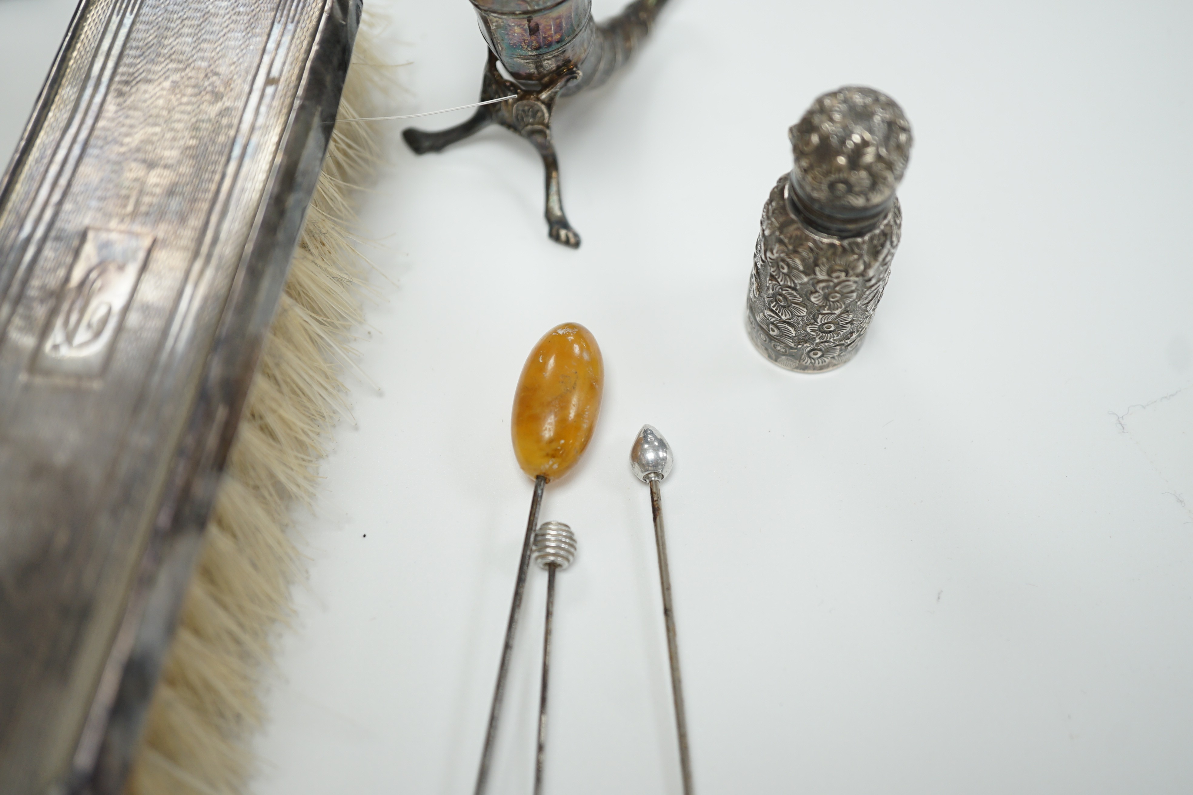 A George V silver mounted trinket box, Elkington & Co, Birmingham, 1918, 13.1cm, a silver mustard pot, two Scandinavian 925 condiments, two silver mounted scent bottles, hatpins and hatpin stand and a silver mounted thre